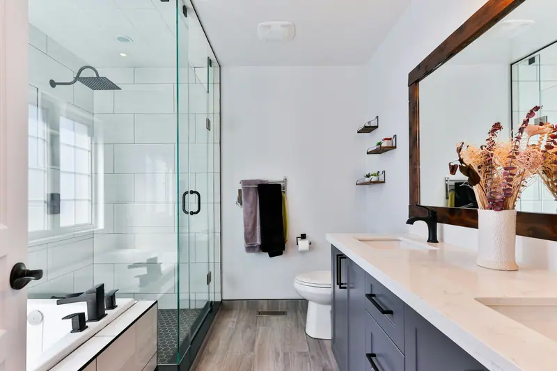 Modern remodeled bathroom with glass shower